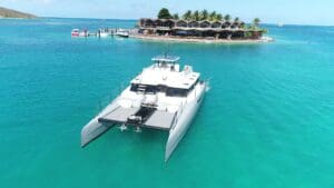 Voodoo catamaran anchored in front of Saba Rock, BVI